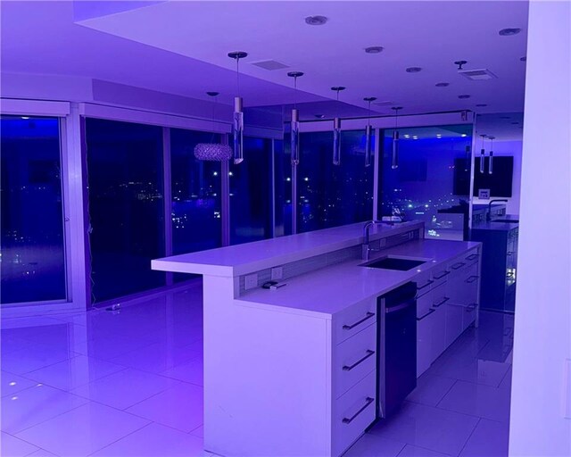 361 17th St NW Unit 2423, Atlanta, GA 30363 - bar with a sink, light tile patterned floors, and pendant lighting