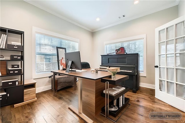 home office with ornamental molding and dark wood-type flooring