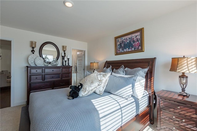 bedroom featuring carpet