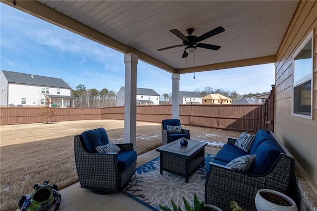 view of patio featuring ceiling fan and an outdoor living space