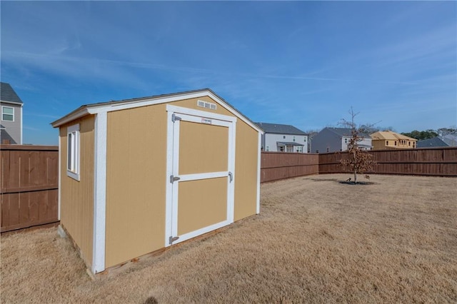 view of outbuilding featuring a lawn