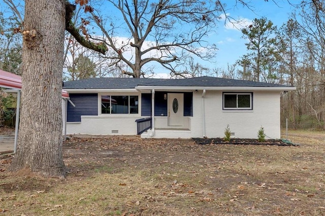 ranch-style house with brick siding and crawl space