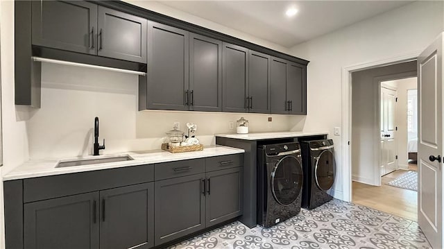320 Shady Grove Ln, Alpharetta, GA 30009 - washroom with washing machine and clothes dryer, cabinet space, and baseboards
