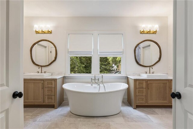 320 Shady Grove Ln, Alpharetta, GA 30009 - full bathroom featuring a soaking tub and two vanities