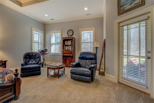 sitting room featuring carpet flooring, ornamental molding, baseboards, and recessed lighting
