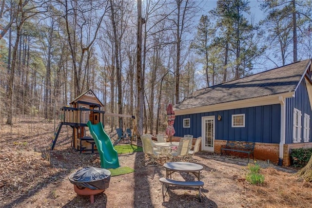 view of yard with a playground