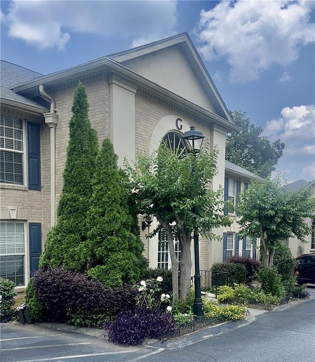 750 Dalrymple Rd Unit G3, Atlanta, GA 30328 - view of property exterior with brick siding