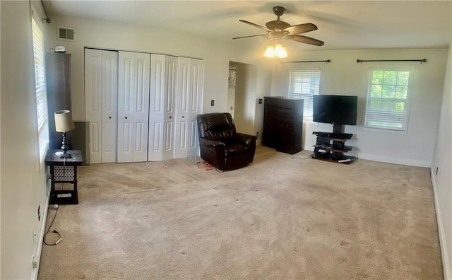 750 Dalrymple Rd Unit G3, Atlanta, GA 30328 - carpeted living area featuring ceiling fan and baseboards