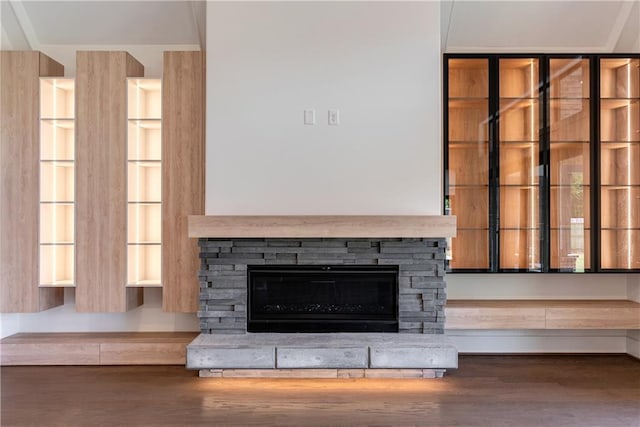 details featuring a fireplace and hardwood / wood-style flooring