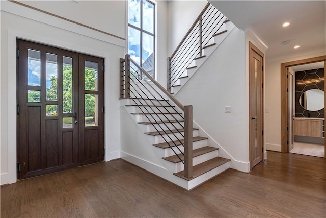 foyer featuring dark wood-type flooring