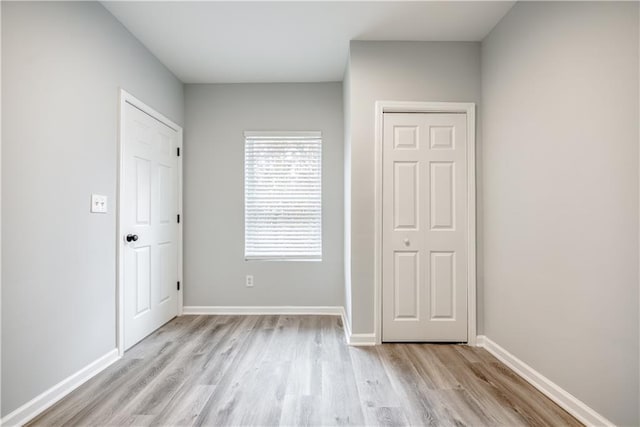 unfurnished bedroom featuring light hardwood / wood-style flooring