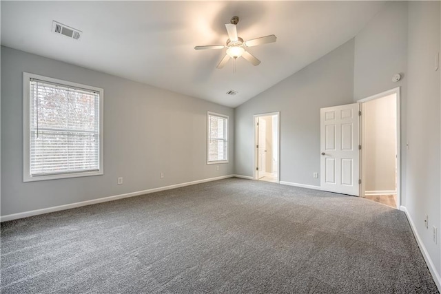 unfurnished room featuring ceiling fan, carpet floors, and high vaulted ceiling