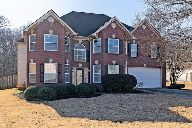 view of front of property featuring a garage