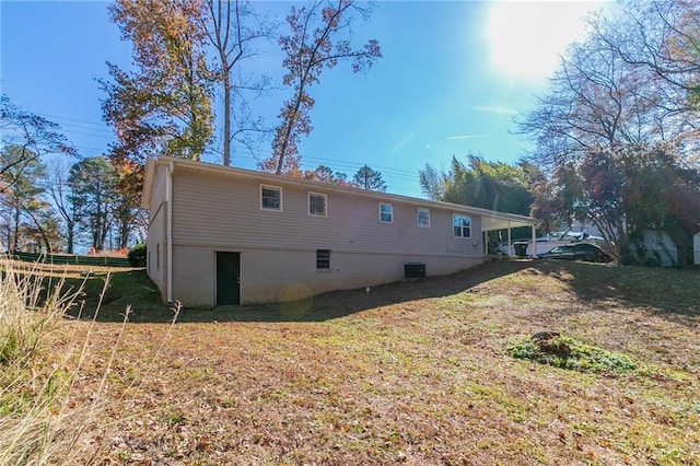 8775 Lee Rd, Lithia Springs, GA 30122 - rear view of house featuring a lawn