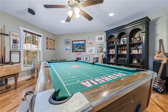 game room featuring a ceiling fan, baseboards, recessed lighting, and light wood-style flooring
