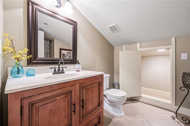 bathroom featuring vanity, vaulted ceiling, toilet, and visible vents