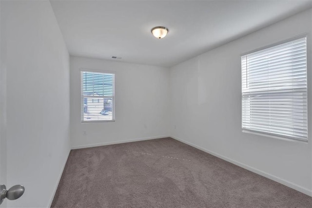 view of carpeted spare room