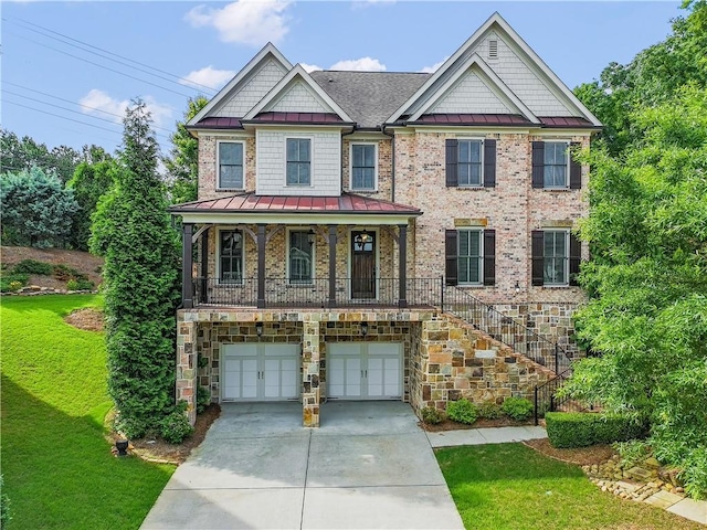 3394 Bryerstone Cir SE, Smyrna, GA 30080 - view of front of property with a standing seam roof, an attached garage, a front yard, concrete driveway, and metal roof