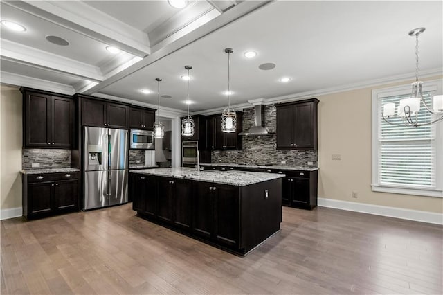 3394 Bryerstone Cir SE, Smyrna, GA 30080 - kitchen with appliances with stainless steel finishes, crown molding, a chandelier, wall chimney range hood, and decorative backsplash