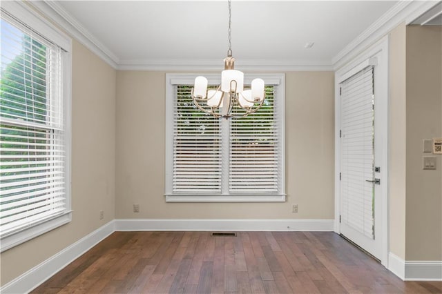 3394 Bryerstone Cir SE, Smyrna, GA 30080 - unfurnished dining area featuring a chandelier, wood finished floors, baseboards, and ornamental molding