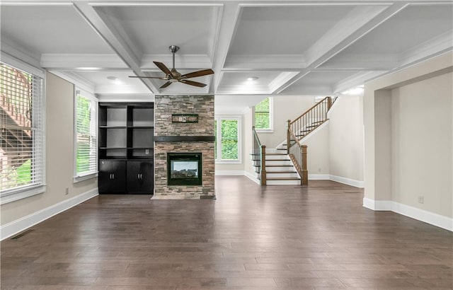 3394 Bryerstone Cir SE, Smyrna, GA 30080 - unfurnished living room with hardwood / wood-style floors, ceiling fan, stairway, a fireplace, and beamed ceiling
