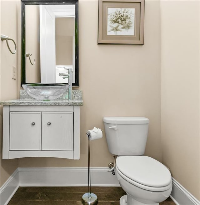 3394 Bryerstone Cir SE, Smyrna, GA 30080 - bathroom with baseboards, toilet, and vanity