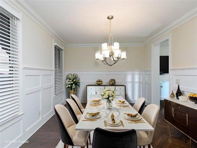 3394 Bryerstone Cir SE, Smyrna, GA 30080 - dining space featuring a chandelier, crown molding, a decorative wall, and wainscoting
