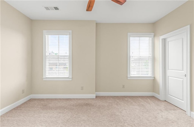 3394 Bryerstone Cir SE, Smyrna, GA 30080 - spare room with light carpet, healthy amount of natural light, and baseboards