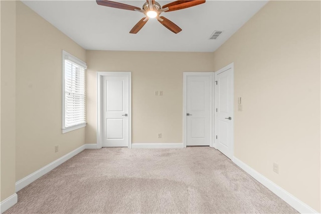 3394 Bryerstone Cir SE, Smyrna, GA 30080 - unfurnished bedroom with light carpet, baseboards, and ceiling fan