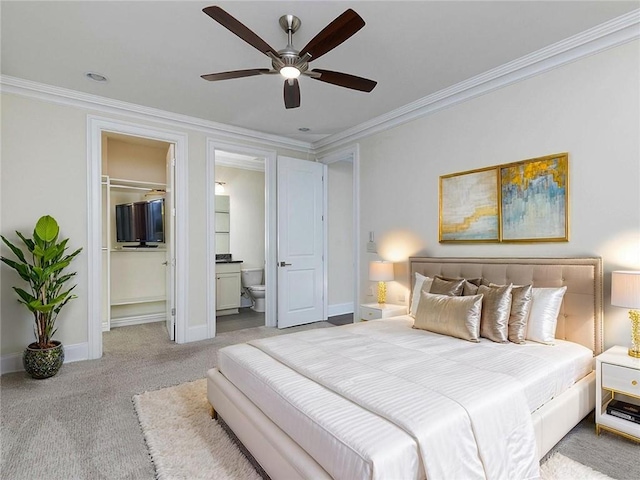 3394 Bryerstone Cir SE, Smyrna, GA 30080 - bedroom featuring crown molding, carpet floors, a walk in closet, baseboards, and ceiling fan
