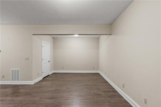 3394 Bryerstone Cir SE, Smyrna, GA 30080 - unfurnished room featuring dark wood-style flooring and baseboards