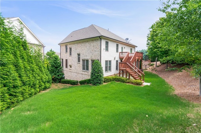 3394 Bryerstone Cir SE, Smyrna, GA 30080 - rear view of house featuring stairway, a yard, a wooden deck, and brick siding