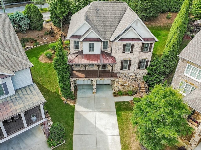 3394 Bryerstone Cir SE, Smyrna, GA 30080 - view of front of house with a standing seam roof, a shingled roof, metal roof, stairs, and concrete driveway
