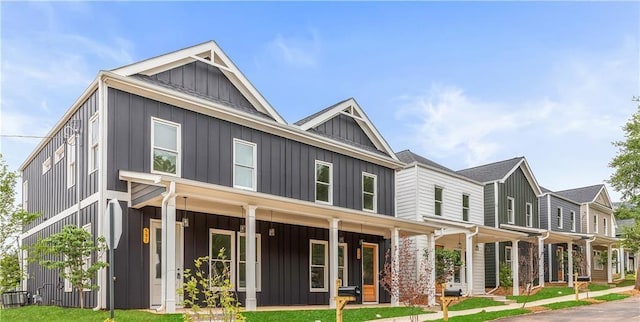 view of front of home with a porch and board and batten siding