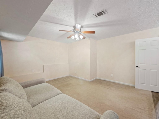 4654 Fox Forrest Dr, Flowery Branch, GA 30542 - living area with carpet, a ceiling fan, baseboards, and a textured ceiling
