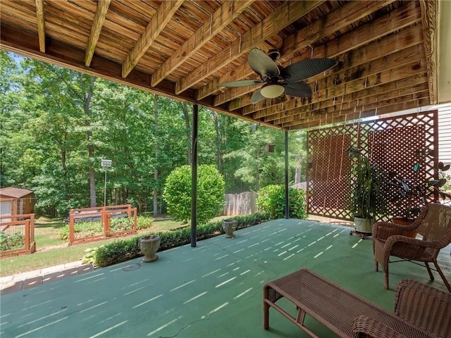 4654 Fox Forrest Dr, Flowery Branch, GA 30542 - view of patio with ceiling fan and an outdoor structure