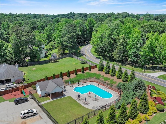 4654 Fox Forrest Dr, Flowery Branch, GA 30542 - drone / aerial view of a pool area and a heavily wooded area
