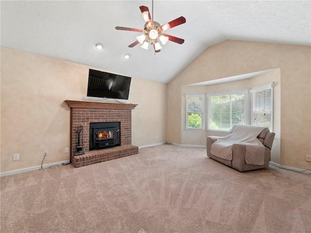 4654 Fox Forrest Dr, Flowery Branch, GA 30542 - living room featuring lofted ceiling, a ceiling fan, carpet, and baseboards
