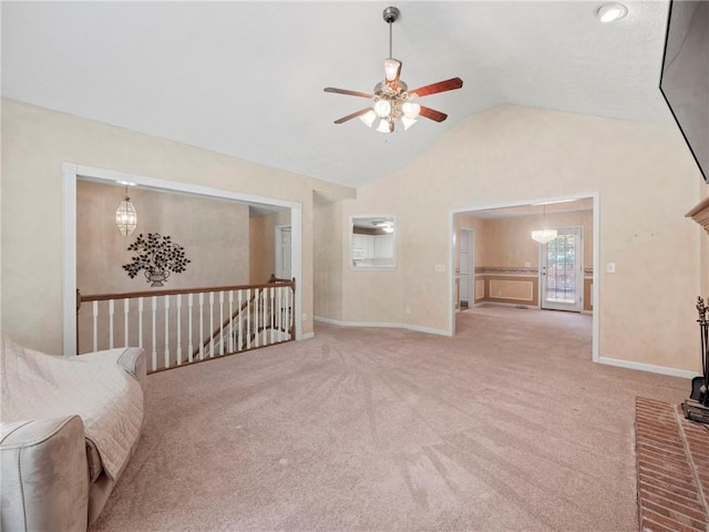4654 Fox Forrest Dr, Flowery Branch, GA 30542 - unfurnished living room featuring ceiling fan, lofted ceiling, carpet, baseboards, and a chandelier