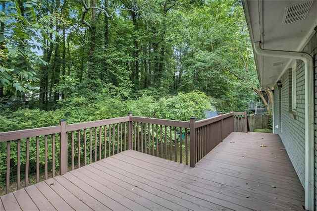 637 Carlouetta Rd SW, Mableton, GA 30126 - wooden terrace with a wooded view