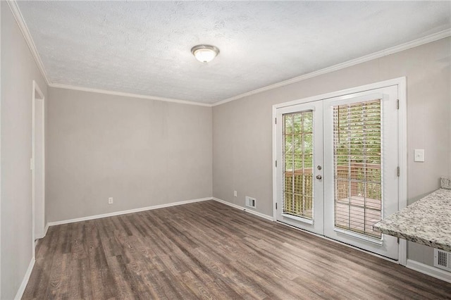 637 Carlouetta Rd SW, Mableton, GA 30126 - unfurnished room featuring wood finished floors, french doors, crown molding, and a textured ceiling