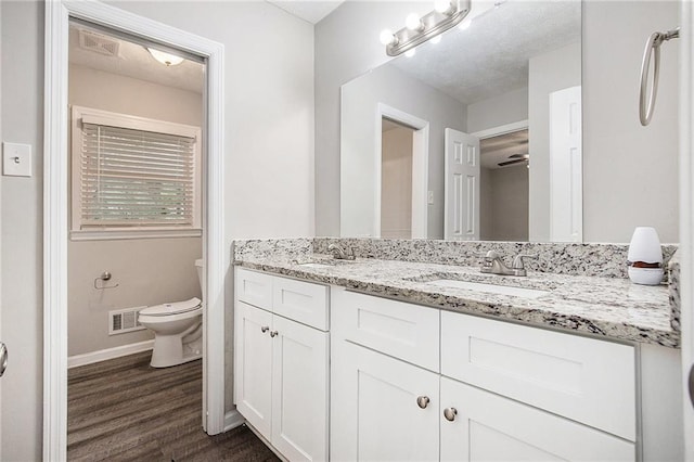637 Carlouetta Rd SW, Mableton, GA 30126 - bathroom featuring double vanity and wood finished floors