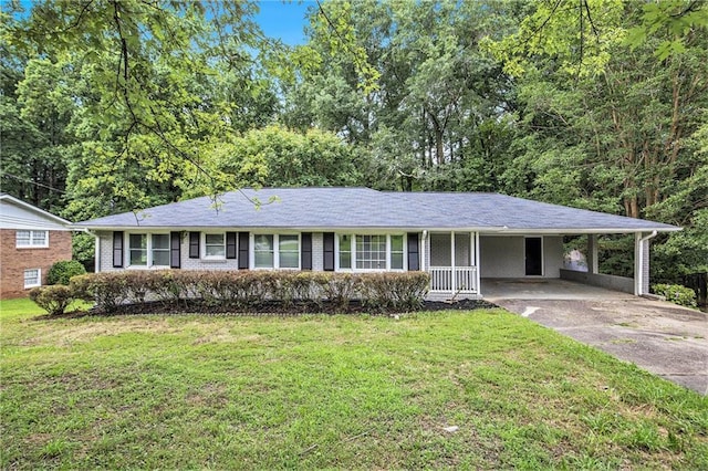637 Carlouetta Rd SW, Mableton, GA 30126 - ranch-style house with a front yard, a carport, and concrete driveway