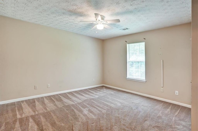 501 Barhams Ridge Dr, Mcdonough, GA 30252 - carpeted empty room with visible vents, baseboards, and ceiling fan