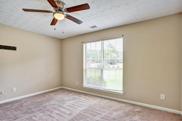 501 Barhams Ridge Dr, Mcdonough, GA 30252 - empty room with a textured ceiling, carpet floors, visible vents, and baseboards