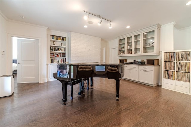 5960 Overlook Club Cir, Suwanee, GA 30024 - kitchen with dark wood-style flooring, crown molding, glass insert cabinets, white cabinetry, and built in features