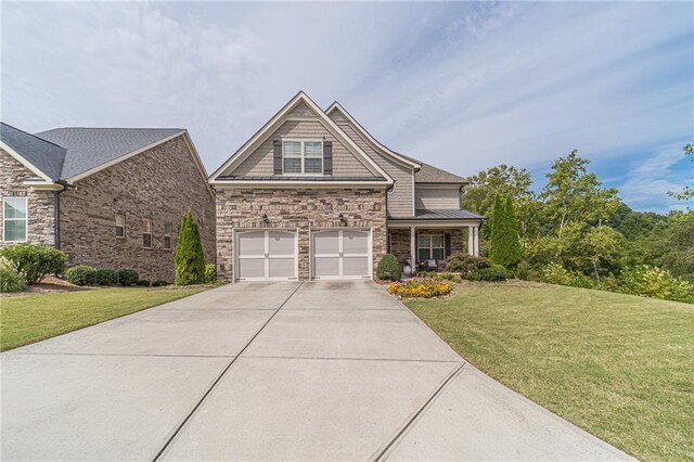5960 Overlook Club Cir, Suwanee, GA 30024 - view of front of house featuring stone siding, driveway, a front yard, and a garage