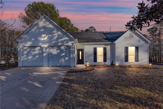 4100 Chanticleer Dr NW, Kennesaw, GA 30152 - view of front of property featuring driveway and an attached garage