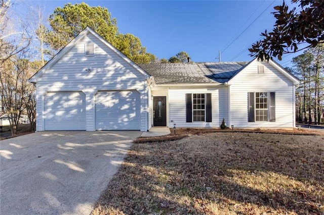 ranch-style home featuring a garage