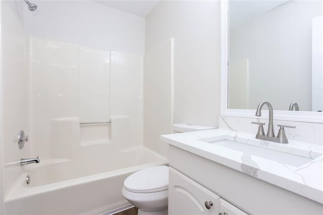 full bathroom with toilet, vanity, and shower / bath combination